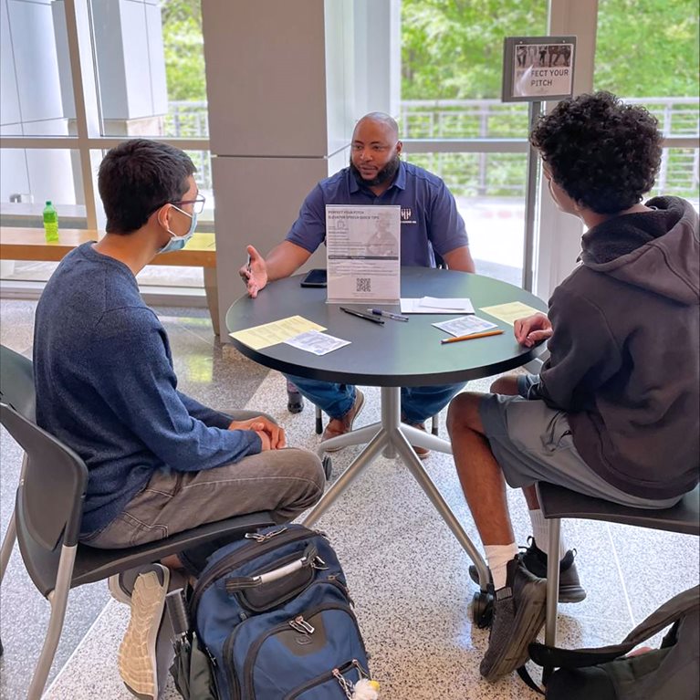 David Williams (center), HVRP North Carolina Program Manager, meeting with Wake Technical Community College students.